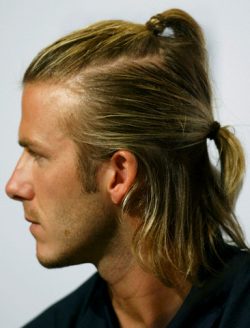 REAL MADRID’S BECKHAM LOOKS ON AT NEWS CONFERENCE IN HONG KONG